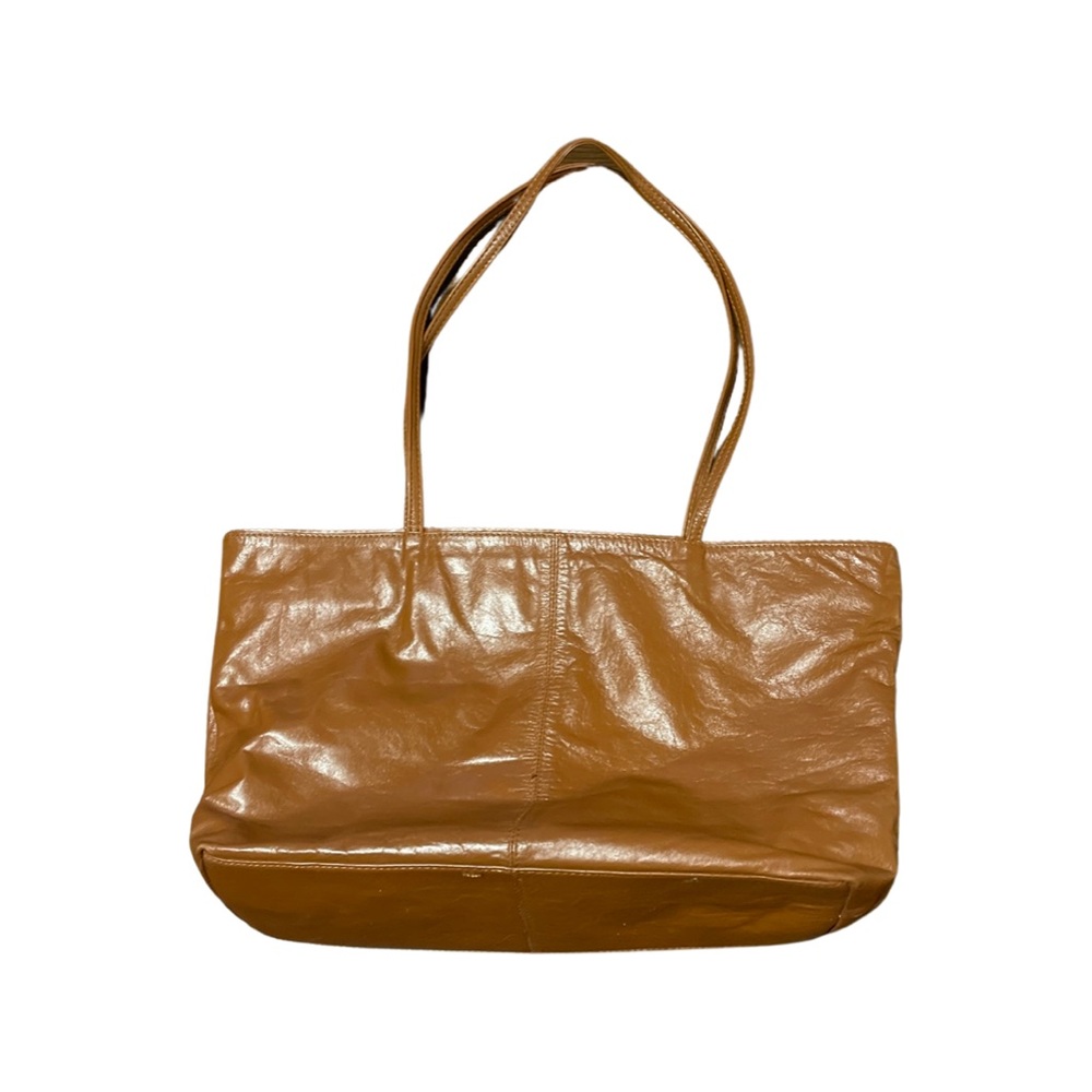 Leather brown tote bag. 10” long x 16.5” wide.